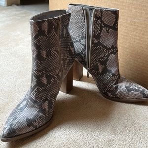 Snakeskin heeled booties